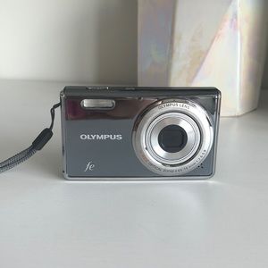 Olympus Nikon Coolpix point and shoot camera
